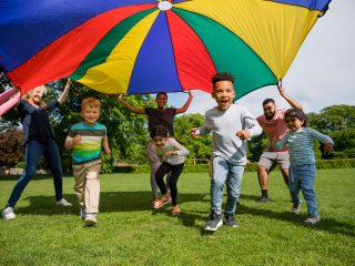 Children playing parachute games