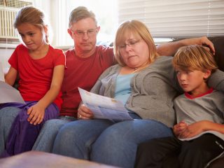 Struggling family on couch