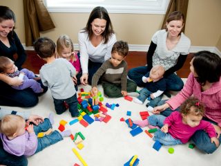 Group of mums with their young children